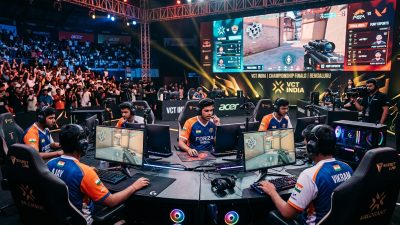 Indian esports athletes at gaming stations with Asian Games 2026 logo and India flag in background
