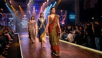 Indian fashion runway showcasing Indo-Western fusion and pre-draped saree trends of 2026