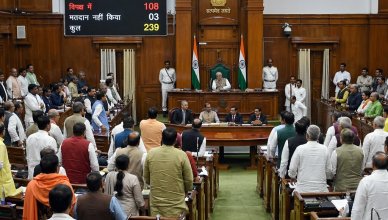Bihar Vidhan Sabha during floor test vote with lawmakers standing as results are displayed