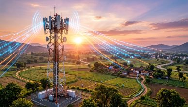 Modern telecom tower with 5G antenna arrays against sunrise sky in Indian landscape