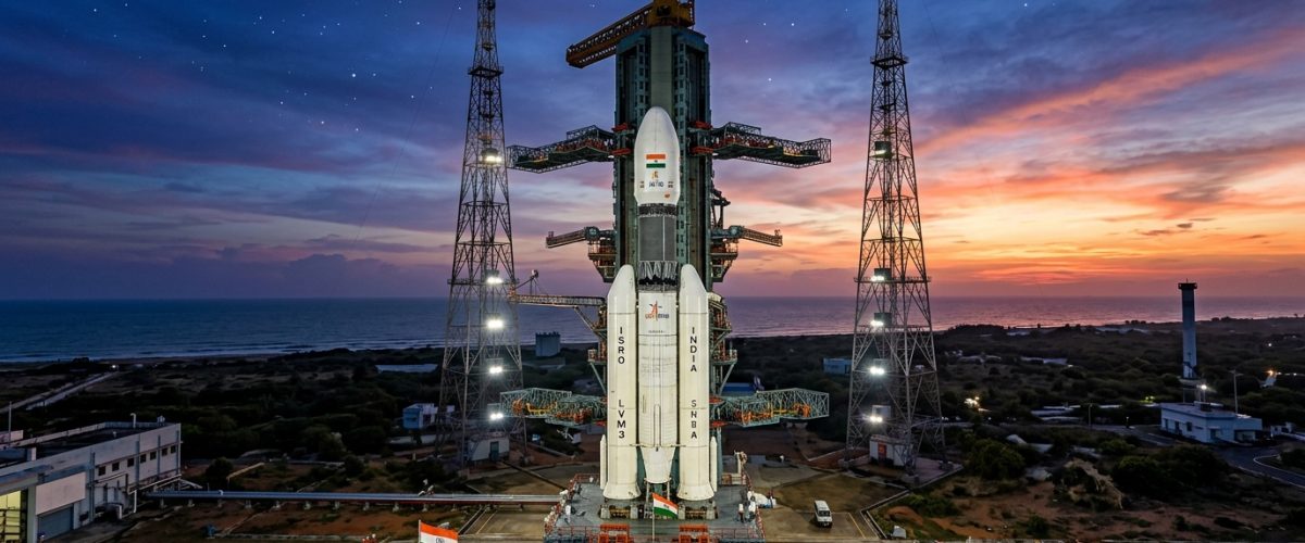 ISRO Gaganyaan rocket on launch pad at Sriharikota with Indian flag and sunrise sky