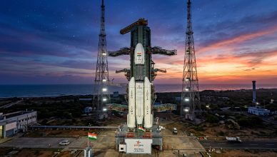 ISRO Gaganyaan rocket on launch pad at Sriharikota with Indian flag and sunrise sky