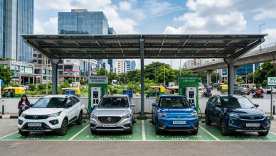 Electric vehicles at a modern charging station in an Indian city