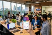 Modern Indian fintech startup office in Bengaluru with digital displays