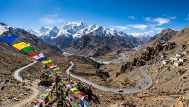 Stunning view of Spiti Valley mountain landscape with clear blue sky and green valley in Indian Himalayas