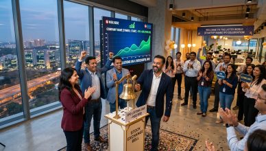 Modern Indian startup office celebrating IPO with stock exchange bell and growth charts