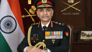 Indian military leadership appointment with officer in full dress uniform and national flag