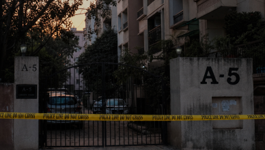 Police investigation at Satyam Apartments in Vasundhara Enclave Delhi after DU professor found murdered