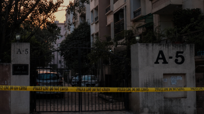 Police investigation at Satyam Apartments in Vasundhara Enclave Delhi after DU professor found murdered